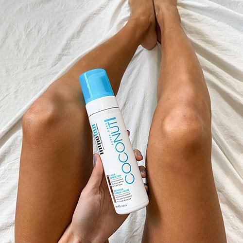 tanned legs in coconnut water self tan foam